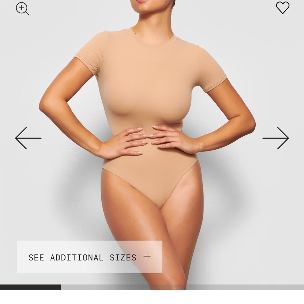 Clay colored short sleeved SKIMS Bodysuit. Medium